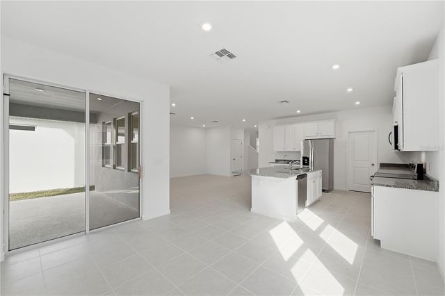 504 GREEN TRACKER AVENUE, Groveland, FL 34736