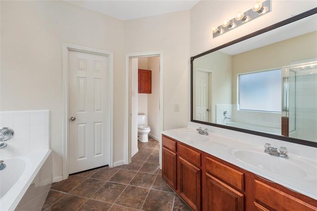 10039 Noisy Waters Drive, Houston, TX 77095