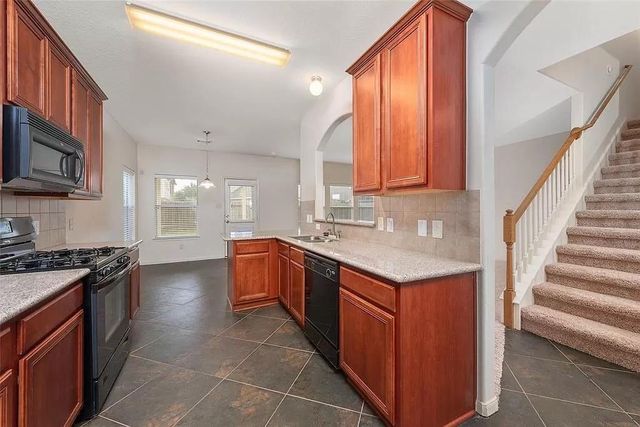 10039 Noisy Waters Drive, Houston, TX 77095