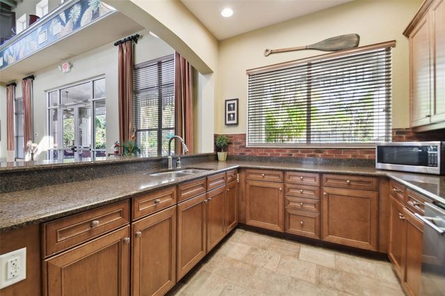 9311 MANGROVE COURT, Tampa, FL 33647