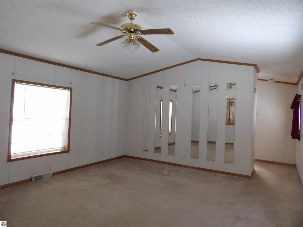 Image 6 of property listing at 380 Fairway Drive, Cadillac, MI 49601