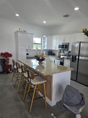 1156 HELEN AVENUE S, Lehigh Acres, FL 33974