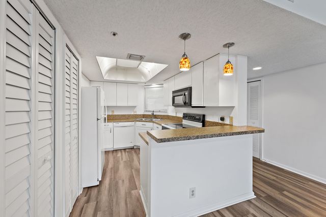 700 Uno Lago Drive 404, Juno Beach, FL 33408