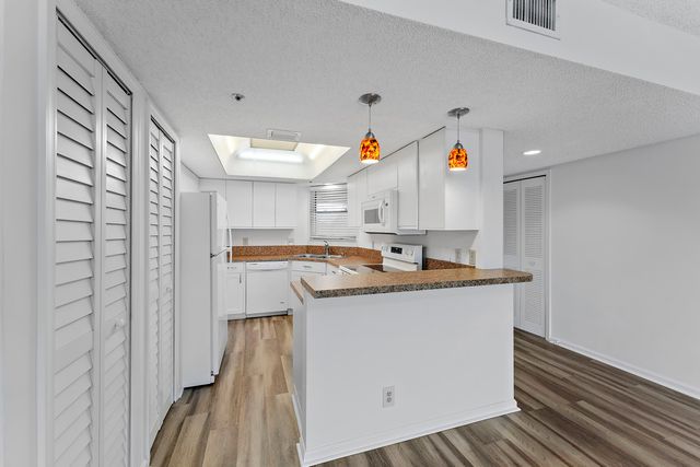 700 Uno Lago Drive 404, Juno Beach, FL 33408