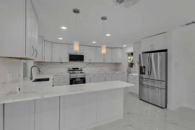 21452 Woodchuck Lane, Boca Raton, FL 33428