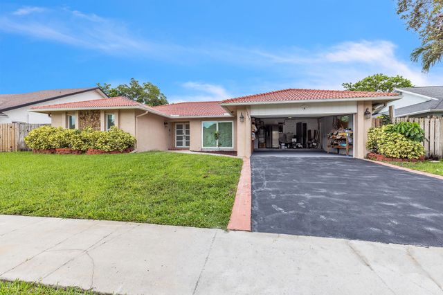 21452 Woodchuck Lane, Boca Raton, FL 33428
