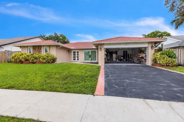 21452 Woodchuck Lane, Boca Raton, FL 33428