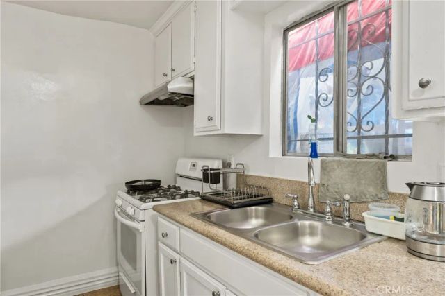 6118 S Main, Los Angeles, CA 90003