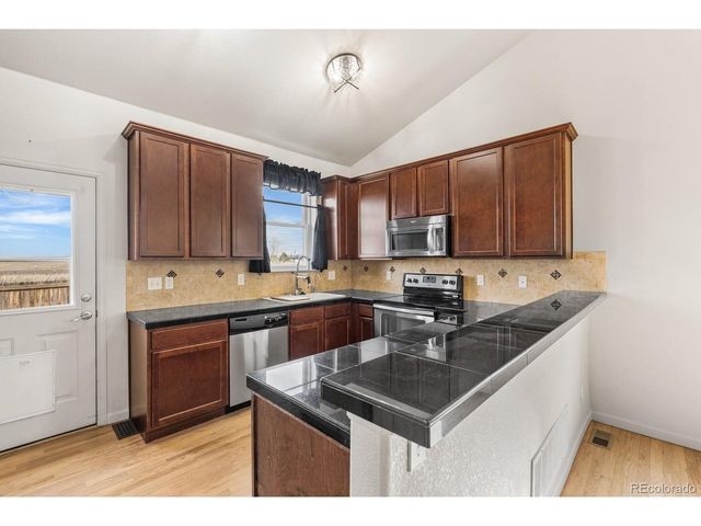 2164 Basil St, Strasburg, CO 80136