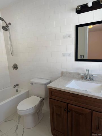 168 Woodycrest Drive, Farmingville, NY 11738