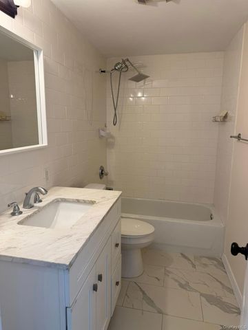 168 Woodycrest Drive, Farmingville, NY 11738