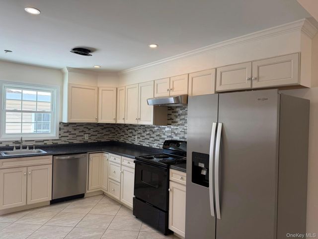 168 Woodycrest Drive, Farmingville, NY 11738