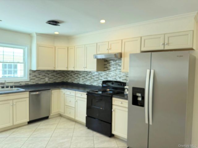 168 Woodycrest Drive, Farmingville, NY 11738