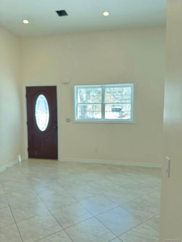 168 Woodycrest Drive, Farmingville, NY 11738