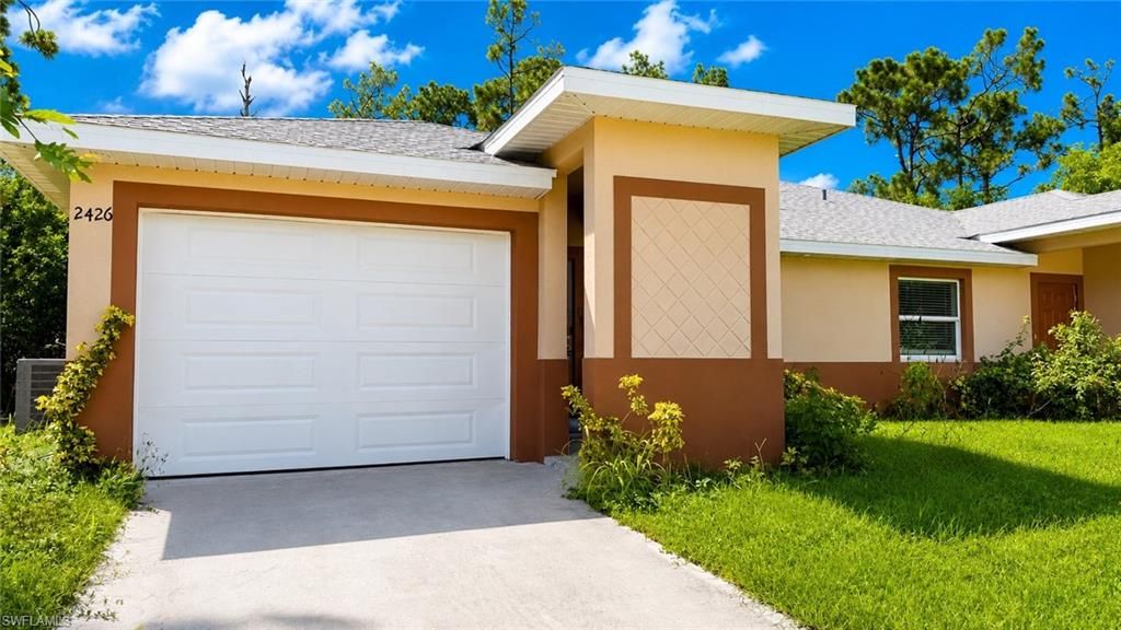 2426 Millie AVE S, LEHIGH ACRES, FL 33973 — photo 3