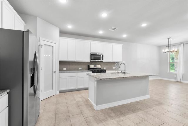 135 Teralyn Grove Loop, Conroe, TX 77318