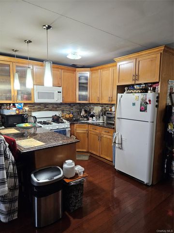 12012 115TH Avenue, South Ozone Park, NY 11420
