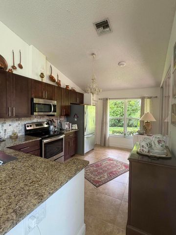 1604 Rosewood Way, Palm Beach Gardens, FL 33418
