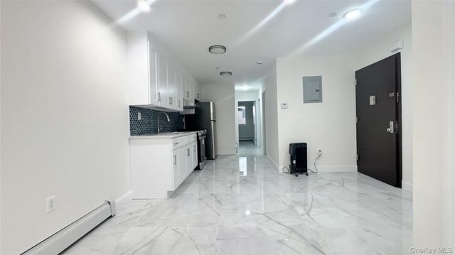 104-49 49th Ave, Corona, NY 11368