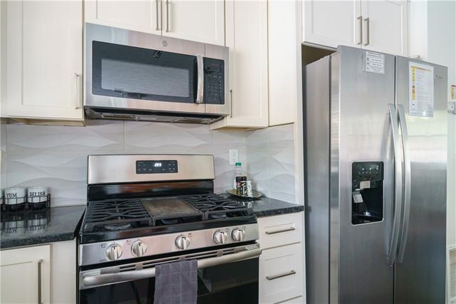 942 Cadencia SW Way, Lilburn, GA 30047