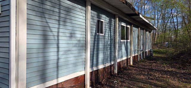 1060 Carmen Drive, Lake Isabella Vlg-shermantwp, MI 48893