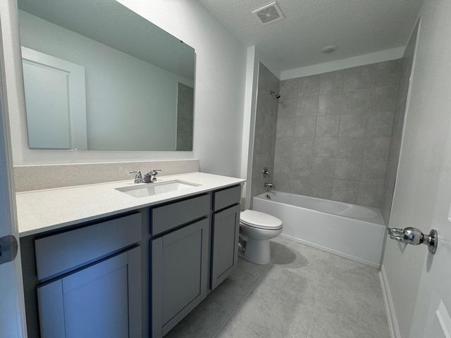 1033 WATERFALL BOULEVARD, Davenport, FL 33837