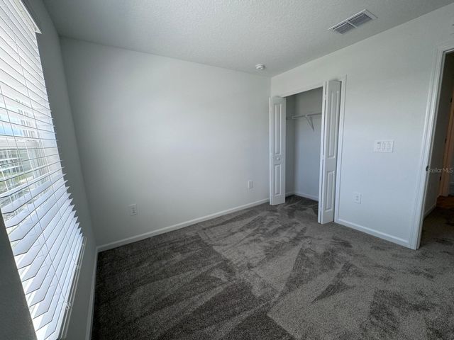 1033 WATERFALL BOULEVARD, Davenport, FL 33837