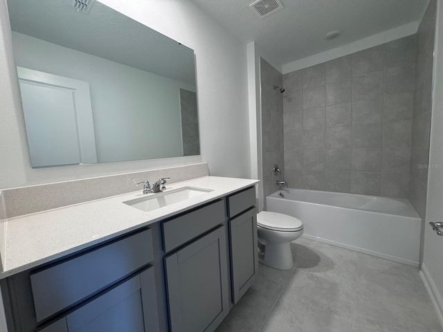 1033 WATERFALL BOULEVARD, Davenport, FL 33837