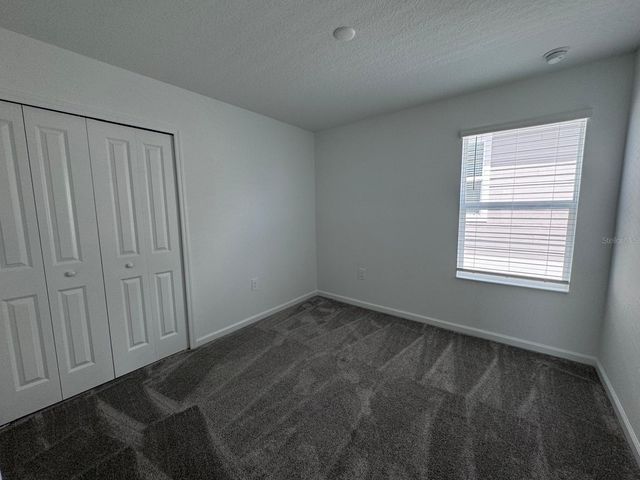 1033 WATERFALL BOULEVARD, Davenport, FL 33837