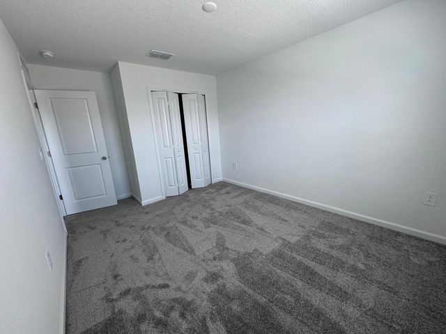 1033 WATERFALL BOULEVARD, Davenport, FL 33837