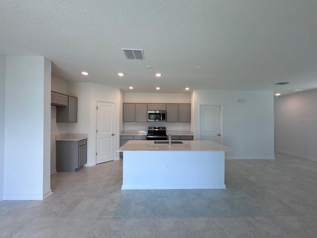 1033 WATERFALL BOULEVARD, Davenport, FL 33837
