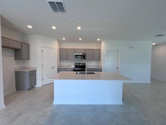 1033 WATERFALL BOULEVARD, Davenport, FL 33837