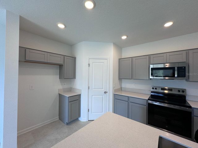 1033 WATERFALL BOULEVARD, Davenport, FL 33837