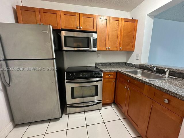 492 NW 165th St Rd C-210, Miami, FL 33169