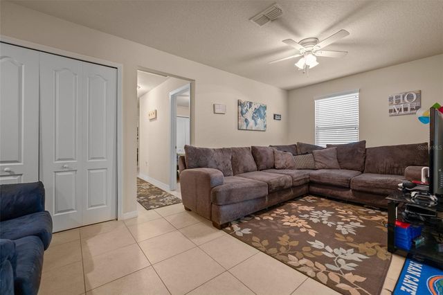 5128 GRASSY KNOLL DRIVE, Tavares, FL 32778