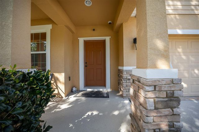 5128 GRASSY KNOLL DRIVE, Tavares, FL 32778