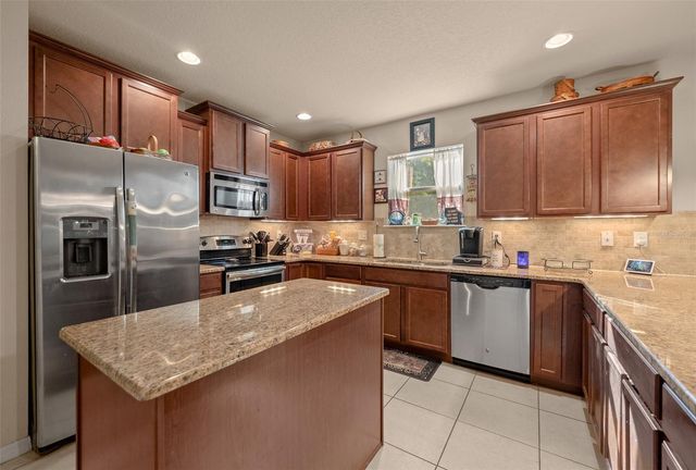 5128 GRASSY KNOLL DRIVE, Tavares, FL 32778