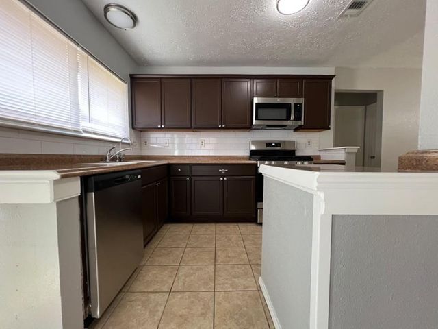 9311 Crescent Moon Drive, Houston, TX 77064