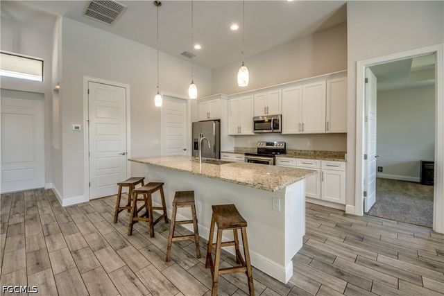 203 SW 14th AVE, Cape Coral, FL 33991