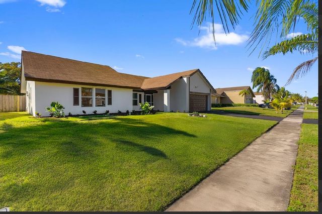 7060 NW 47th Place, Lauderhill, FL 33319