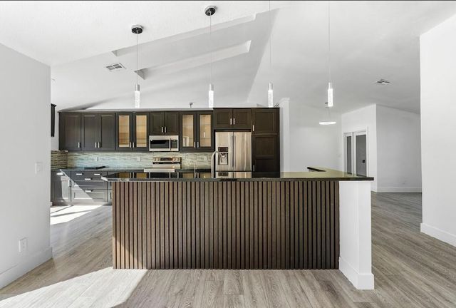 7060 NW 47th Place, Lauderhill, FL 33319