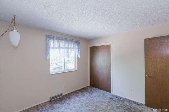 8937 W Woodard Drive, Lakewood, CO 80227