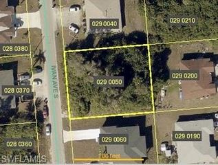 719 Ivan AVE S, Lehigh Acres, FL 33973