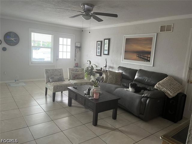 1102 Kanza CT, Lehigh Acres, FL 33936