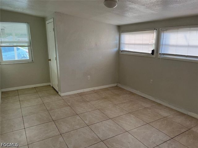 1102 Kanza CT, Lehigh Acres, FL 33936