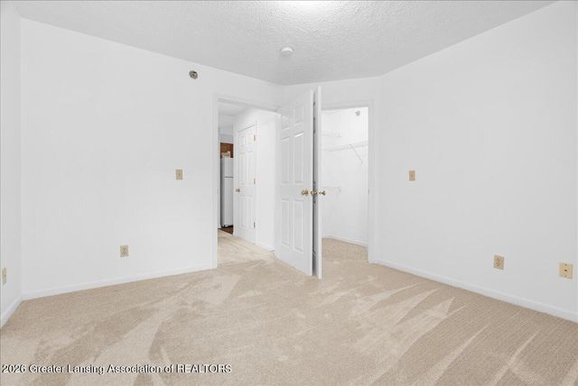 4452 Cricket Ridge Drive 204, Holt, MI 48842