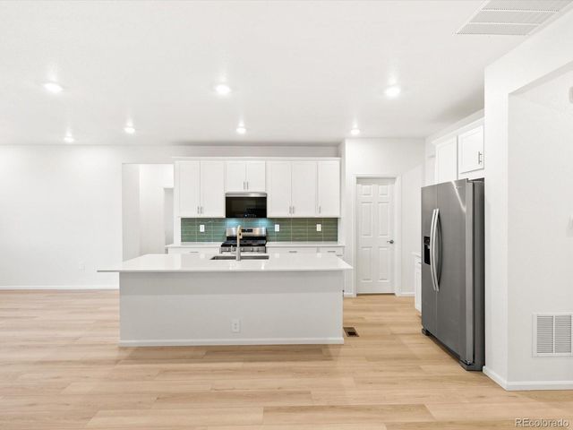 1633 Yampa River Drive, Windsor, CO 80550