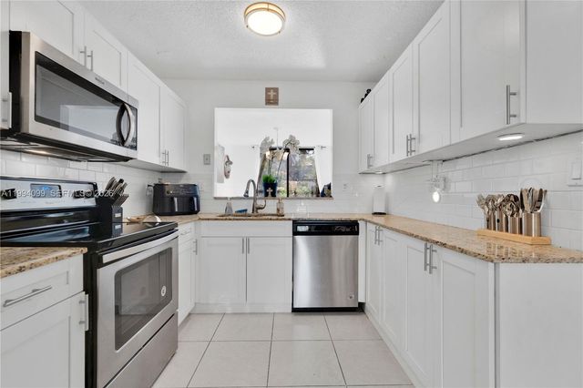 10003 Costa Del Sol Blvd E-67, Doral, FL 33178