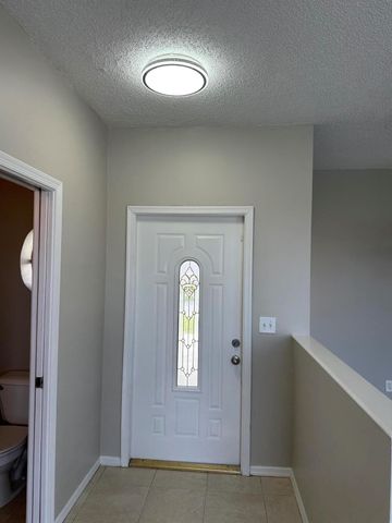 7302 Burgess Drive, Lake Worth, FL 33467