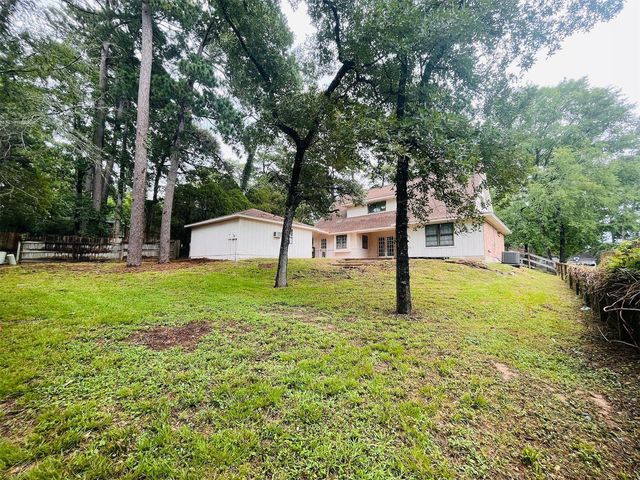 61 Wood Hollow Drive, Conroe, TX 77304